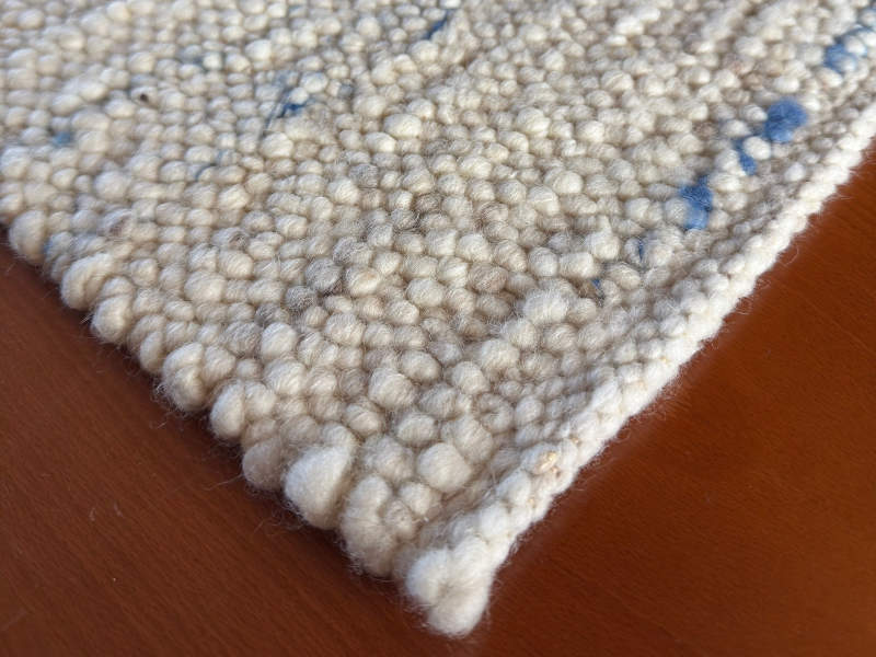 Schafwollteppich in Beige Braun hell (Karakulwolle) mit verlaufenden Noppen in bunt