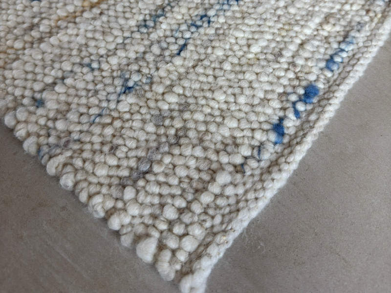Schafwollteppich in Beige Braun hell (Karakulwolle) mit verlaufenden Noppen in bunt
