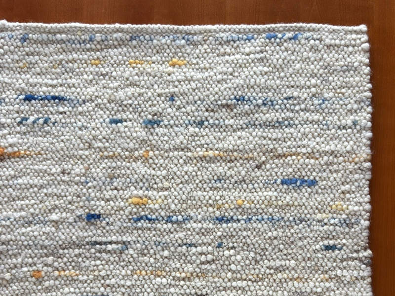 Schafwollteppich in Beige Braun hell (Karakulwolle) mit verlaufenden Noppen in bunt
