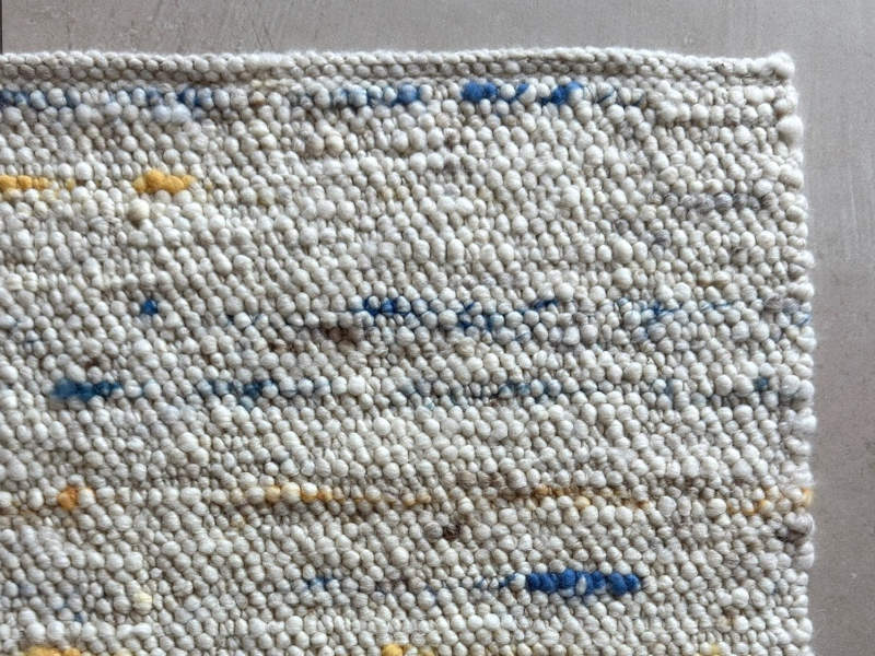 Schafwollteppich in Beige Braun hell (Karakulwolle) mit verlaufenden Noppen in bunt