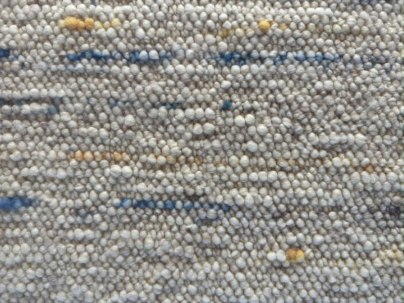 Schafwollteppich in Beige Braun hell (Karakulwolle) mit verlaufenden Noppen in bunt