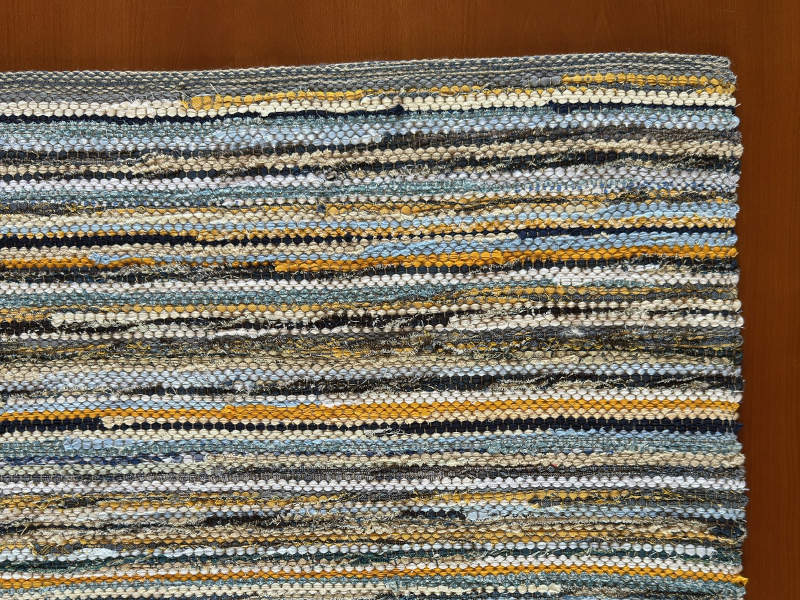 Fleckerlteppich fein und fest verwebt in neuen Baumwollstoffen